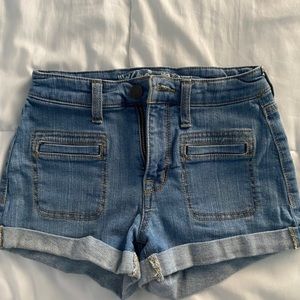 High waisted light blue denim shorts